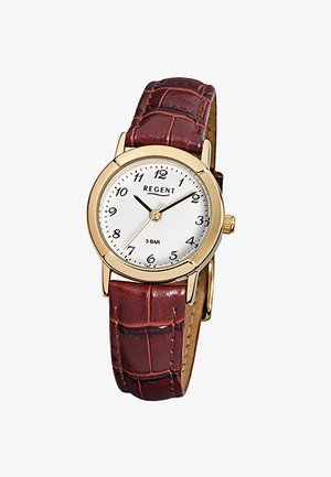 Montre-bracelet classique avec un boîtier rond doré, un cadran blanc avec des chiffres noirs, et un bracelet en cuir marron avec un motif texturé.