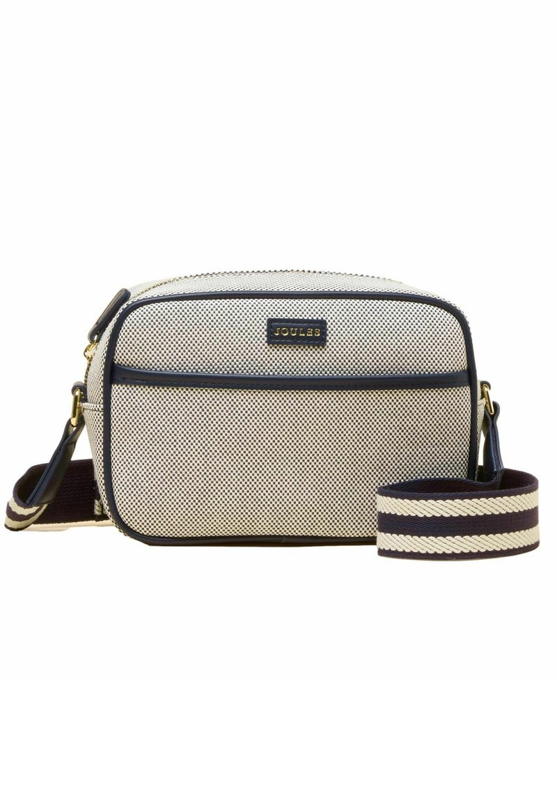 Sac bandoulière compact beige et noir en tissu texturé, avec poche frontale zippée et une sangle d'épaule large rayée amovible.