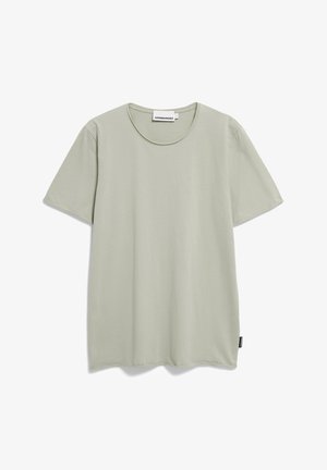 Hellgrünes Baumwoll-T-Shirt mit rundem Halsausschnitt und kurzen Ärmeln. Hat einen geraden Schnitt und ein kleines Markenlabel an der Seitenaht.