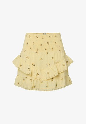 Žuta cvjetna suknja s višeslojnim dizajnom i volanima, s elastikom u struku i delikatnim izvezenim uzorcima.