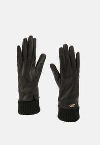 Guantes de cuero negro con puños de punto acanalado. Diseño ajustado con textura suave y detalle sutil del logo en el puño.
