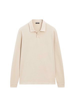Long-sleeve polo shirt in light beige cotton. Features a classic collar, three-button placket, and ribbed cuffs. Simple, minimalist design.