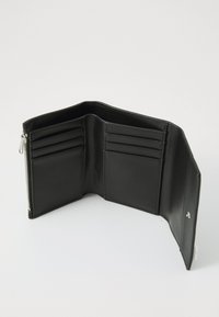 Black leather wallet with a zip closure, multiple card slots, and a smooth texture. The interior features a minimalist design without patterns.
