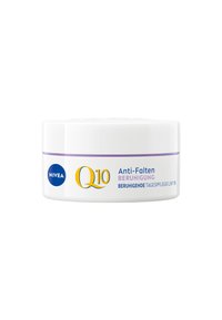 Round white cream jar with a purple stripe and Nivea logo. Label features "Q10 Anti-Falten Beruhigung" and "Beruhigende Tagespflege LSF 15."