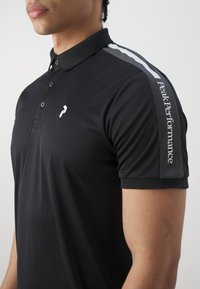 Peak Performance PLAYER - Poloshirts - black/motion grey