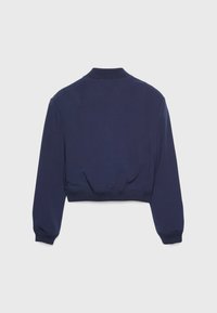 Navy blue cropped jacket in soft fabric, featuring a ribbed collar and cuffs, with a gathered detail at the back hem.
