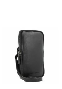 Bolso cruzado de cuero negro con cierre de cremallera, forma rectangular, textura suave y una correa desmontable para mayor versatilidad.