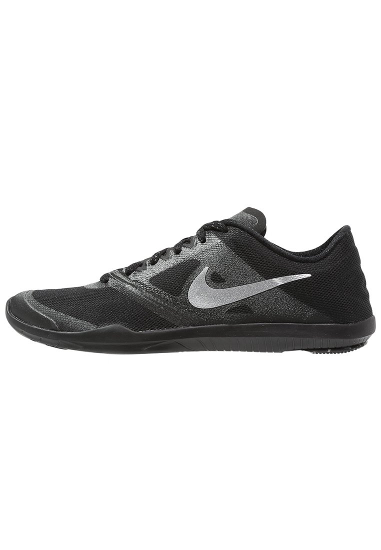 Black athletic shoe with a mesh upper, textured pattern, and silver Nike logo. Features flat laces and a rubber sole for grip.
