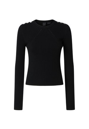 Top lungo a maniche nere a coste con scollatura rotonda e decorazioni sulle spalle. Il tessuto ha una finitura testurizzata, un design aderente e cuciture minime.