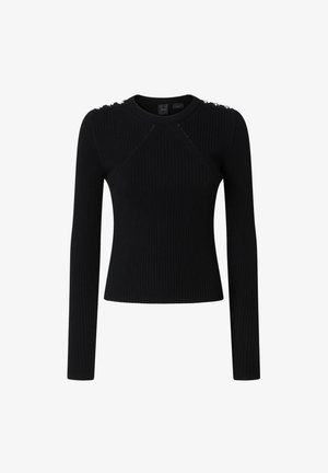 Top lungo a maniche nere a coste con scollatura rotonda e decorazioni sulle spalle. Il tessuto ha una finitura testurizzata, un design aderente e cuciture minime.