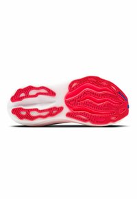 Suela de zapato deportivo con una base blanca y acentos rojos. Goma texturizada para mayor tracción, diseñada con patrones de ondas dinámicas y recortes.