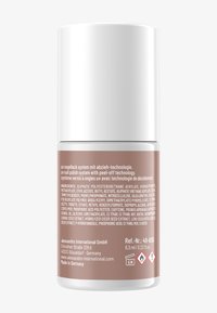 UV-Nagellack in einem zylindrischen Behälter mit weißem Deckel, peachfarbener Etikettierung und gedruckten Inhaltsstoffangaben.