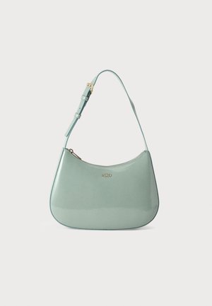 Sac à bandoulière en cuir vert clair avec sangle réglable et fermeture éclair dorée, avec petit logo Furla doré sur l’avant.