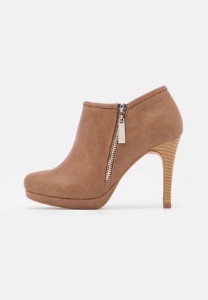 Bottines à talons hauts - beige