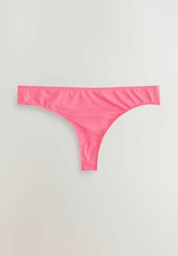 Pink satin thong with a smooth texture, minimal coverage, and a flat waistband. Seamless design and no visible hardware or accents.