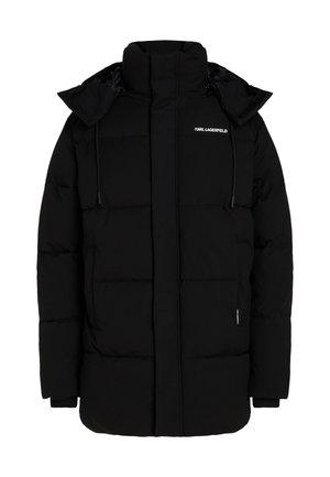Black puffer jacket featuring a high collar, zip front, and drawstring hood. Made of quilted fabric with logo detailing on the chest.