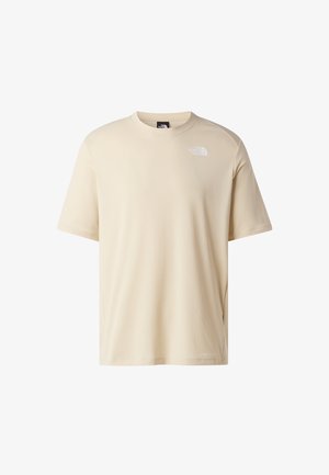 Beżowa koszulka z krótkim rękawem i okrągłym dekoltem, z małym białym logo "The North Face" na lewej piersi.