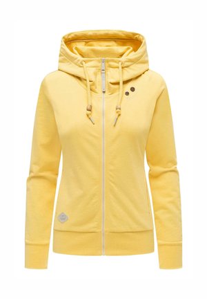 Felpa gialla con zip frontale, ampio cappuccio, coulisse con perline di legno, maniche lunghe e polsini e orlo a costine.