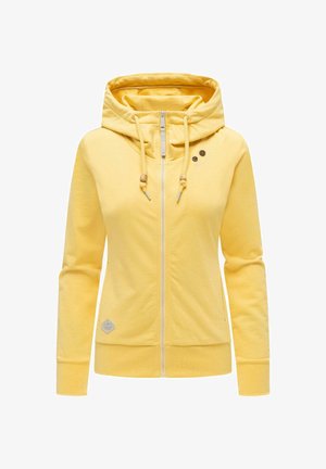 Żółta bluza na zamek z dużym kapturem, troczkami z drewnianymi koralikami, długimi rękawami oraz ściągaczami na mankietach i dole.