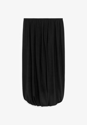Jupe longue noire avec taille élastique et tissu froncé créant une forme ballon à l'ourlet.