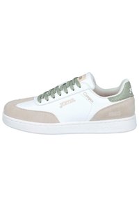 Zapatilla blanca y beige con cordones verdes, acentos de malla texturizada y una sutil marca. Presenta un diseño clásico de corte bajo y suela de goma.