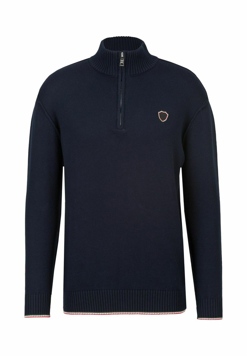 Marineblaues Strickpullover mit einem halben Reißverschlusskragen, gerippten Bündchen und Saum. Mit einem kleinen Wappenlogo in roten und weißen Akzenten am unteren Ende.