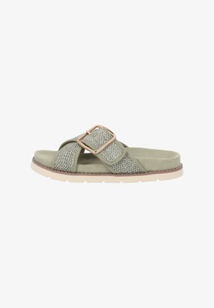 Green slide sandal featuring woven textile straps, a metallic buckle accent, soft suede footbed, and a light rubber sole with a tread design.