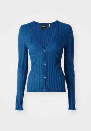 Cardigan blu ribbed con scollo a V, maniche lunghe e chiusura a cinque bottoni. Il materiale ha una texture morbida con un aspetto leggermente trasparente.
