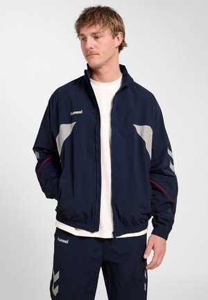 Hummel, HUMMEL HMLWORLD 26 TRACK ZIP JACKET UNISEX - Trainingsvest - dark sapphire
