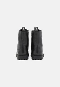 Copenhagen Shoes Botines con cordones - black
