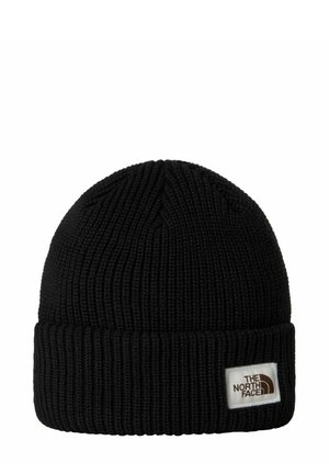 Czarna dziana czapka z prążkowaną strukturą, z wywiniętym mankietem i białą metką z logo The North Face z przodu.