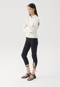 INES - Sandals - black/white
