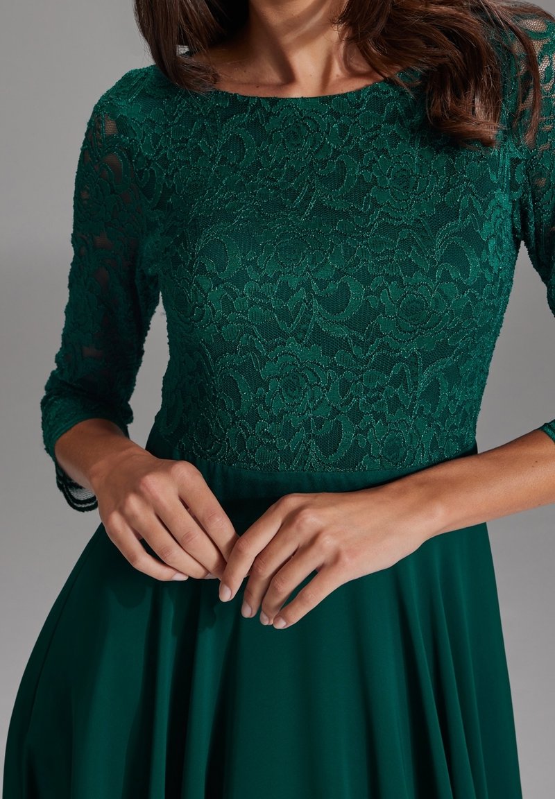 slim fit dress slacks Bombshell Swing Dress in Hunter Green