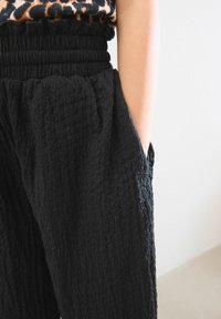 Next RELAXED FIT PRINT  - Trousers - black