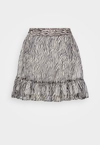 Gjennomsiktig skjørt med zebra-mønster som har volangkant, i svart og hvitt, og elastisk liv for en behagelig passform.