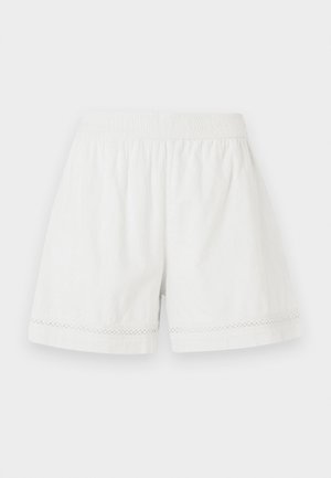 White linen shorts featuring an elastic waistband, relaxed fit, and decorative lace trim at the hem. Smooth texture and casual design.