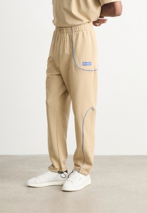 HUGO NIPIPEPANT - Tracksuit bottoms - medium beige