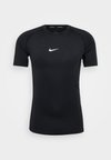 TIGHT - T-shirt till träning - black/white