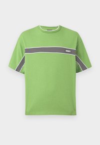 Green short-sleeve t-shirt made of cotton, featuring a gray horizontal stripe and white accents, with a logo on the chest.