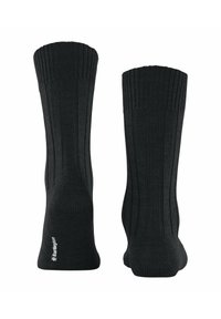 Czarne, prążkowane skarpetki wykonane z dzianiny. Posiadają wzmocnioną piętę i palce, z zagiętym mankietem i subtelnym logiem na podeszwie.