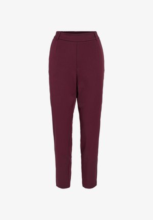 Burgundia värvi püksid, mis on valmistatud siledast kangast, keha pealt kõrge vöökoha, kitsenevate jalgade ja ees olevate voldikargete detailidega. Nähtavaid taskuid ei ole.