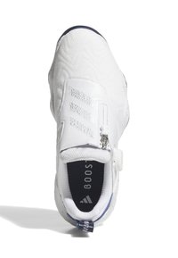 Bílá sportovní obuv s texturovaným svrškem, zapínáním na zip a výrazným logem na stélce. Má kulatou táhlo a podrážku s barevnými skvrnami.