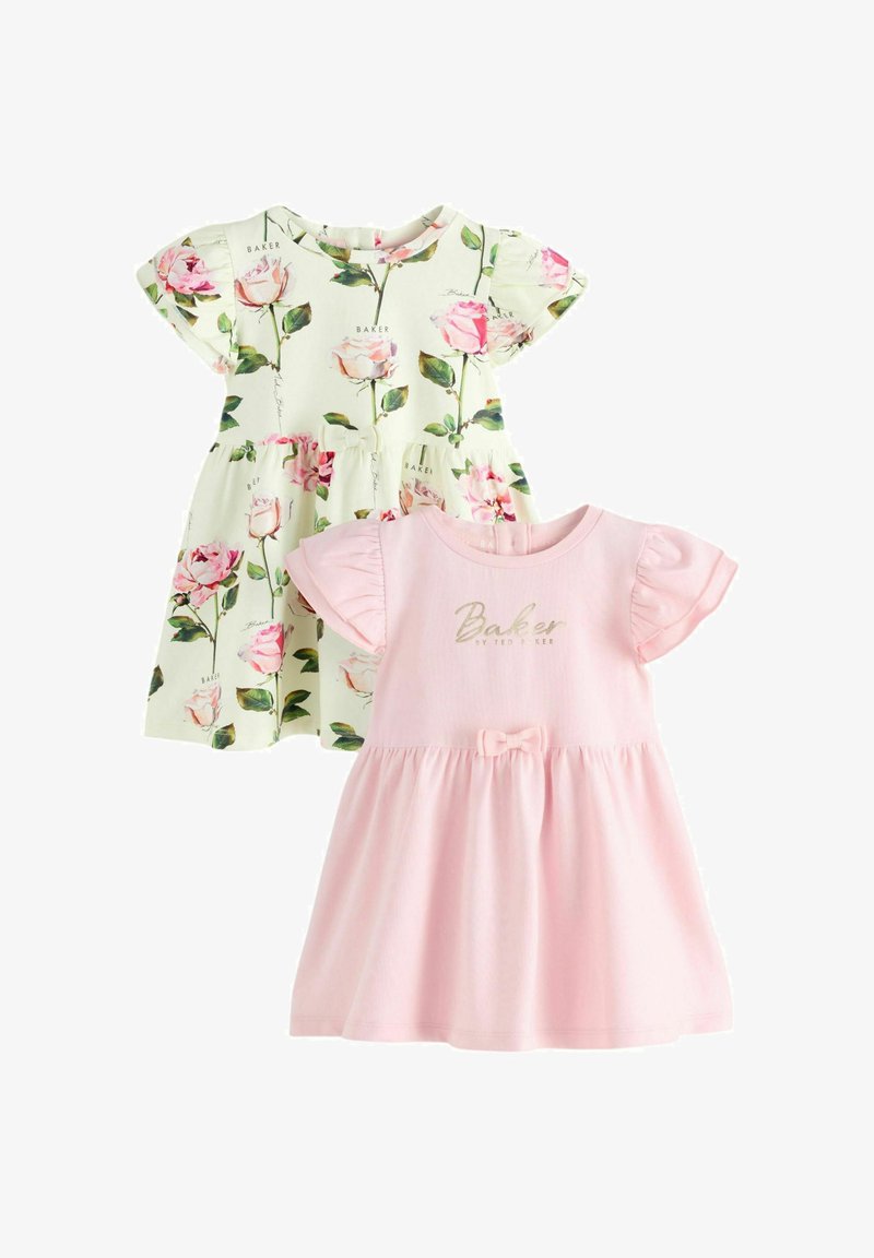 Két ruha: az egyik krémszínű, rózsaszín virágmintával, a másik egyszínű rózsaszín, masni díszítéssel és finom nyomtatott márkajellel. Mindkettő rövid ujjú.