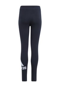 Leggings de color navy fabricados con una tela elástica, con una cintura alta y un gran logo blanco de adidas en la pierna izquierda. Textura suave, diseño ajustado.