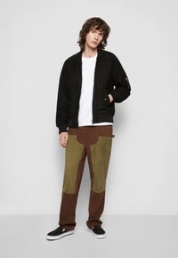 Deadwood COMBO - Casaco de couro - black