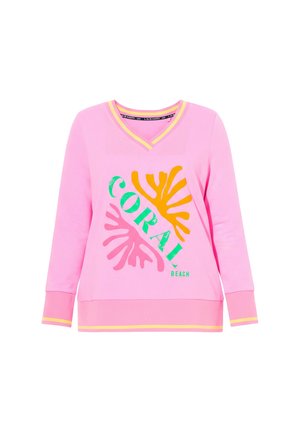 Roze lange mouwen V-hals sweatshirt met gele biezen, een koraalkleurige afbeelding in oranje en roze, en groene tekst met de woorden "CORAL BEACH" aan de voorkant.