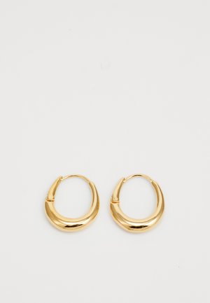 Gold-tone hoop earrings with a smooth, rounded design and minor indentations. They feature a secure hinged clasp for easy wear.