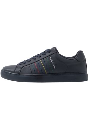 Black low-top sneaker with multicolored side stripes, lace-up design, and "PS Paul Smith" branding on the side and sole.