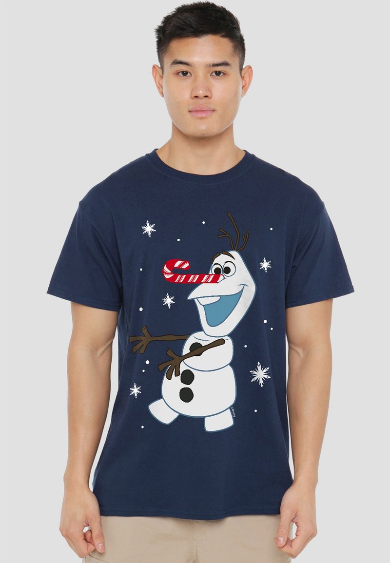 Navy blue cotton t-shirt featuring a smiling snowman character with a candy cane nose, surrounded by snowflakes in white and light blue.