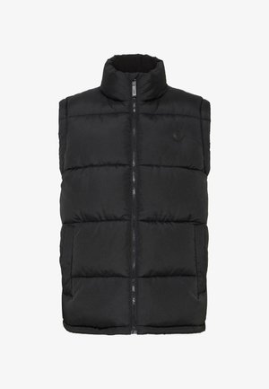 Svart puffervest med høy krage, glidelås og quiltet design. Har to sidelommer og en liten logo på brystet.